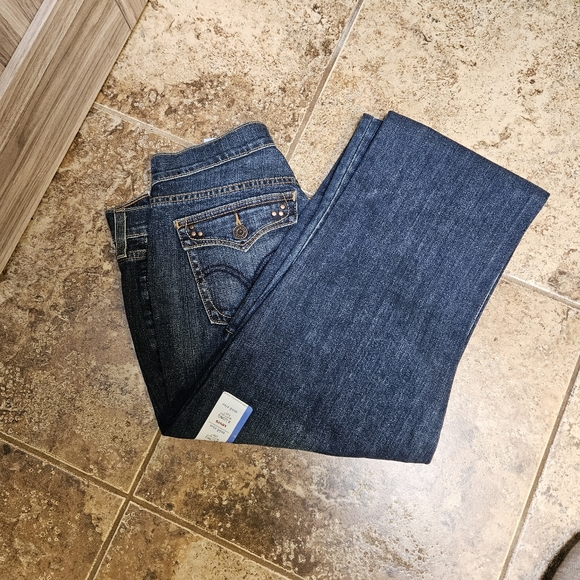 Levi's I  515 Mid Rise Boot Cut Jeans. - Picture 8 of 11